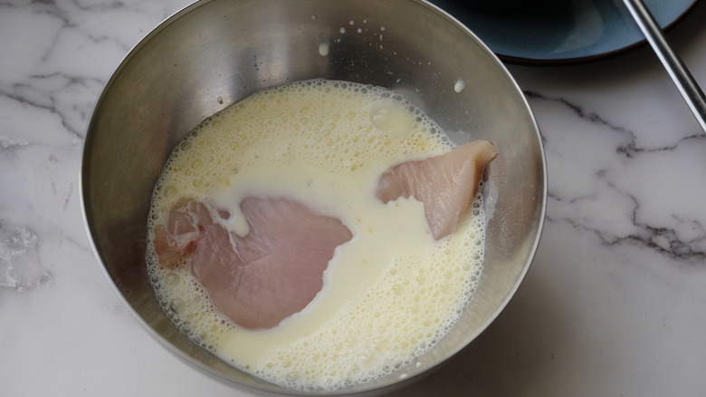 milk and egg in bowl 