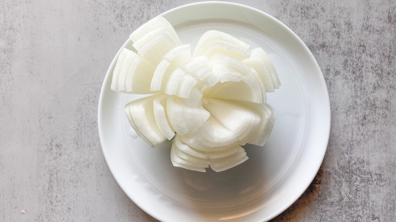 blooming sliced onion on plate