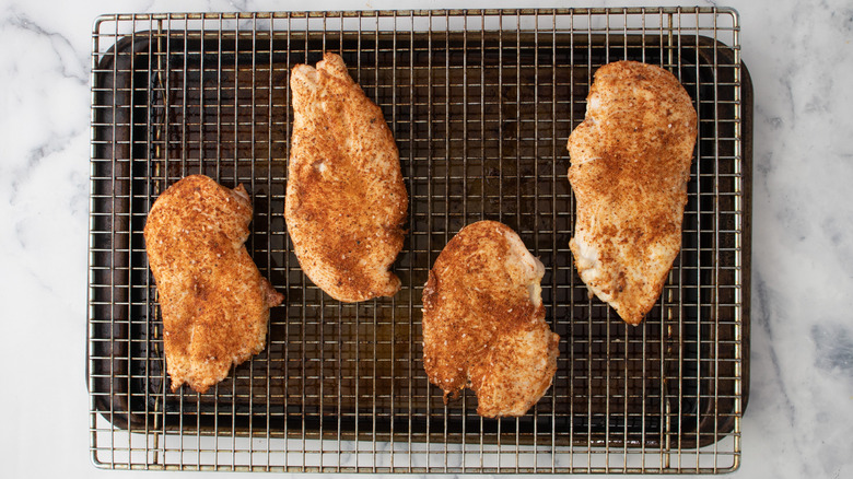 baked chicken breast on rack