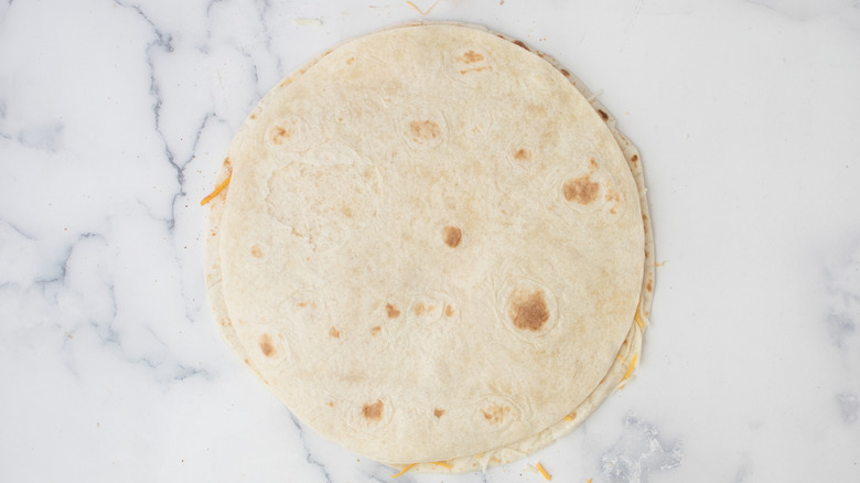 stacked tortillas on counter