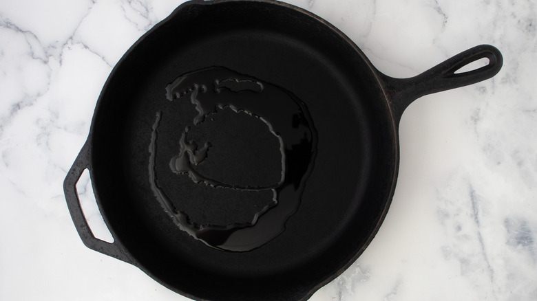 heating oil in skillet