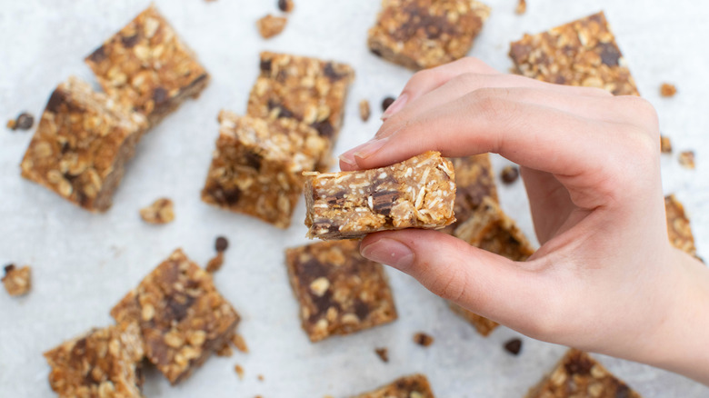 copycat chocolate peanut butter Heavenly Hunks with hand