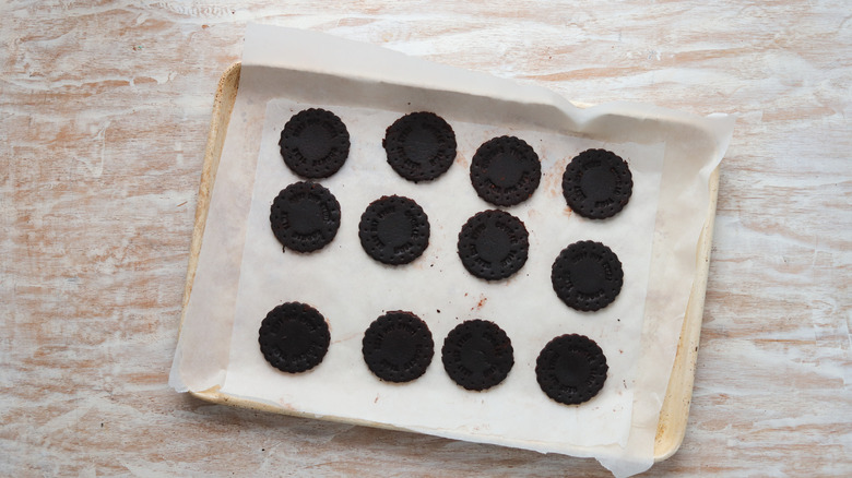 raw cookies on a baking sheet