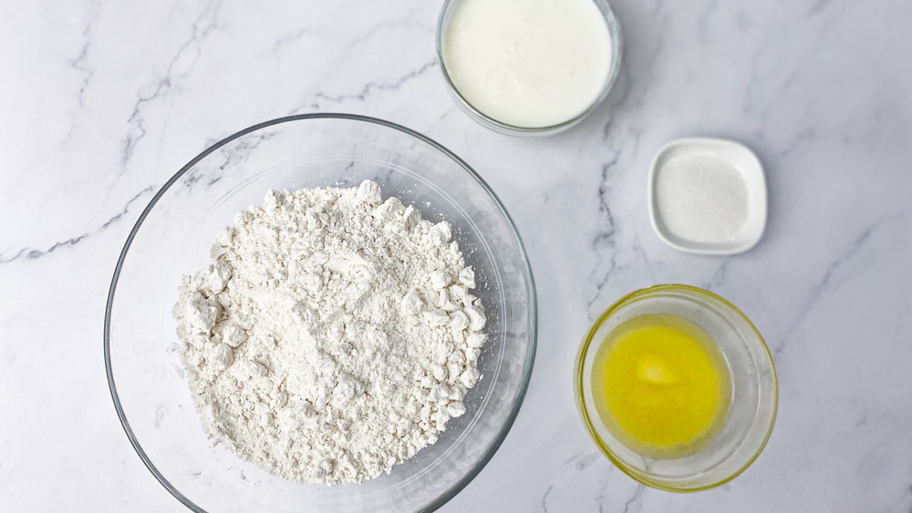 biscuit ingredients in bowls on counter