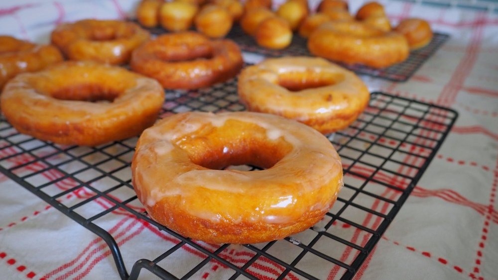 copycat Krispy Kreme glazed donuts on a wire cooling rack