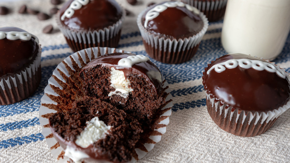 copycat Hostess cupcakes in wrappers on a table