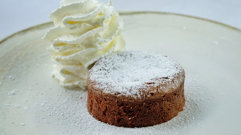 Copycat Domino's chocolate lava crunch cake on plate with whipped cream