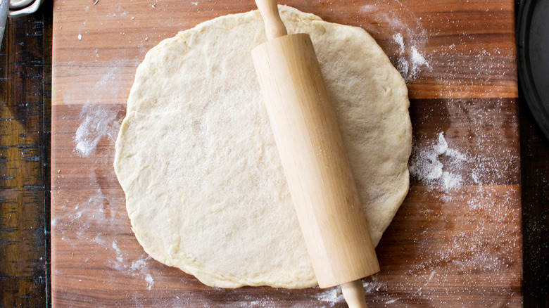 rolling pizza dough