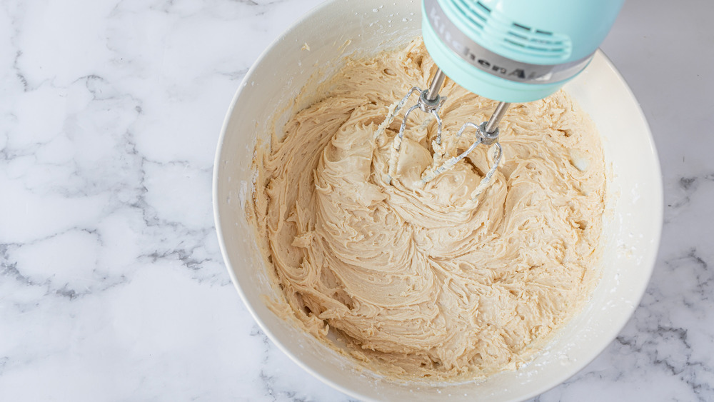 mixing peanut butter frosting for Copycat Girl Scout Do-si-dos