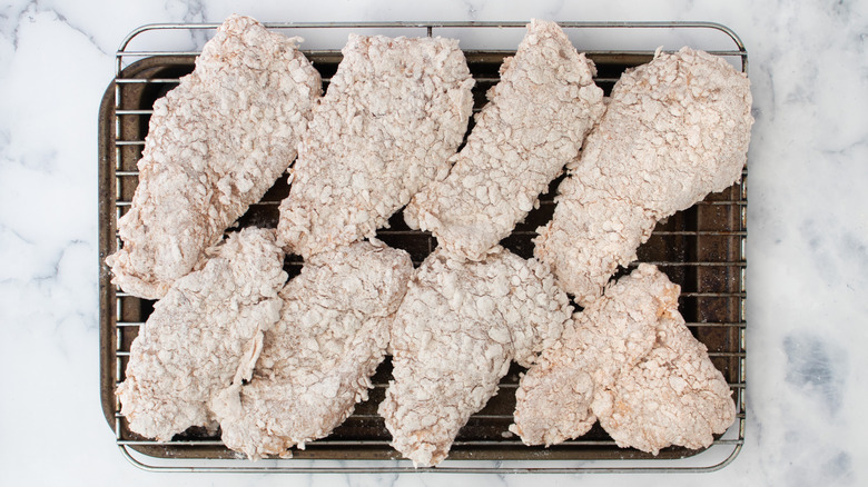 breaded chicken on wire rack