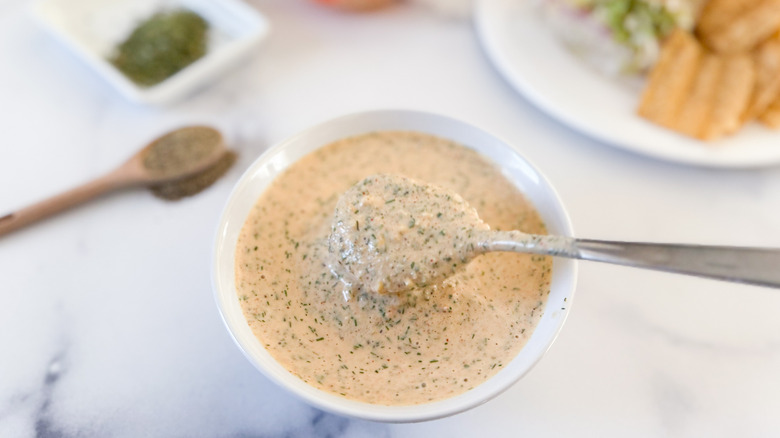 ranch sauce spoon in bowl