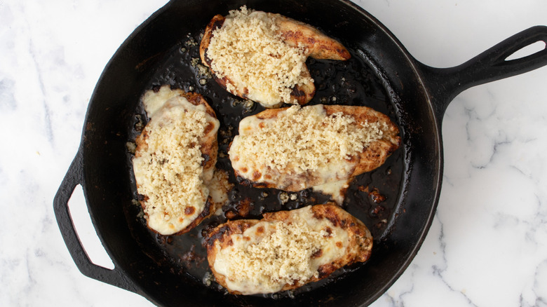 Panko-crusted chicken breasts in skillet