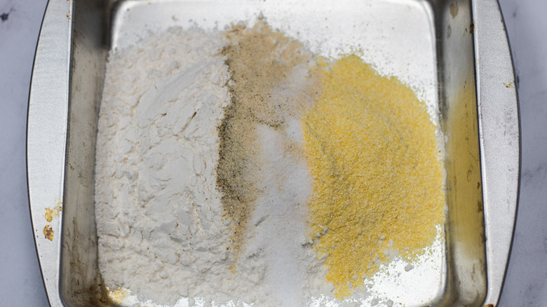 breading ingredients in shallow pan