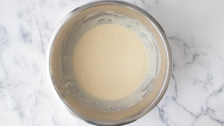 Batter in a metal mixing bowl