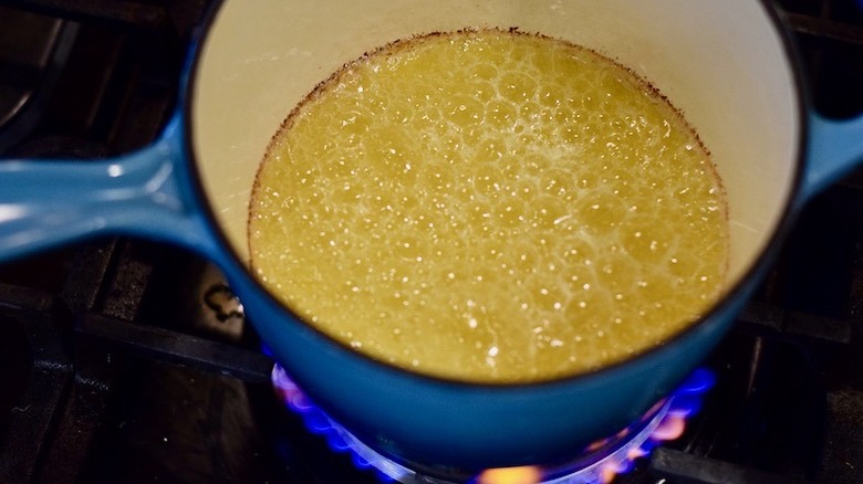 butter boiling in a pot