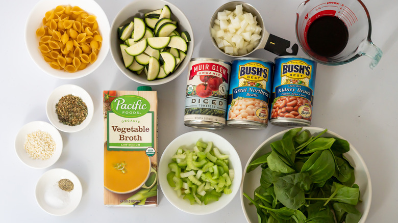 minestrone recipe ingredients in bowls on counter