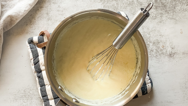 whisk in white sauce