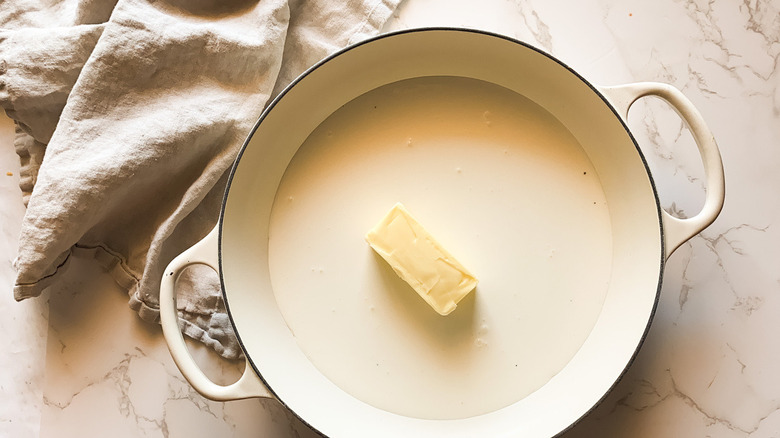 stick of Butter in a pot of whipping cream