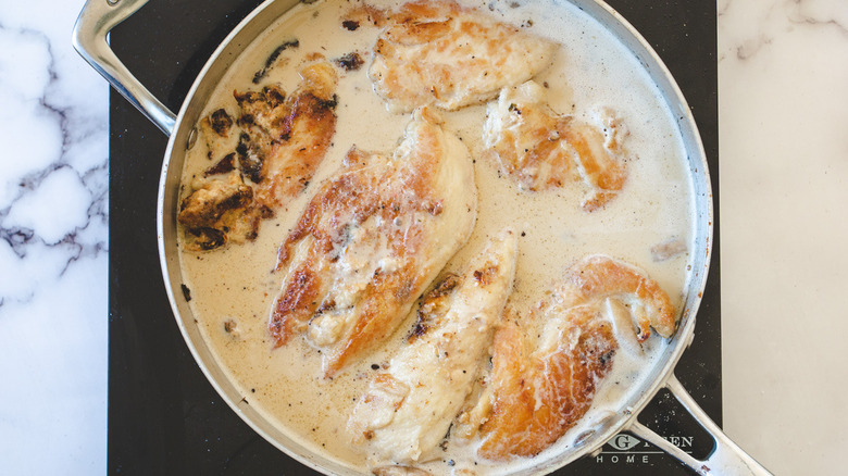 chicken breasts in marsala sauce in pan