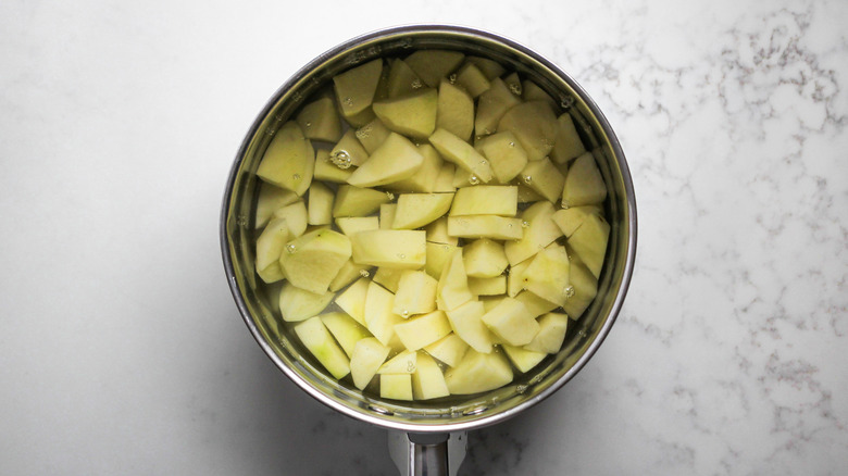 potatoes and water in pot