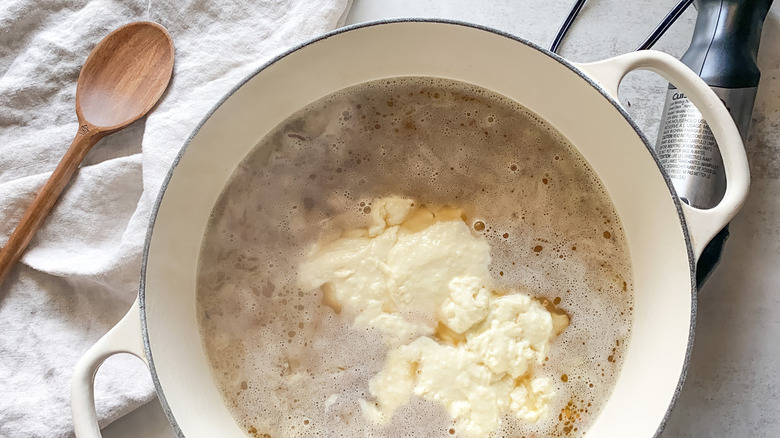 Thick cream added to pot 