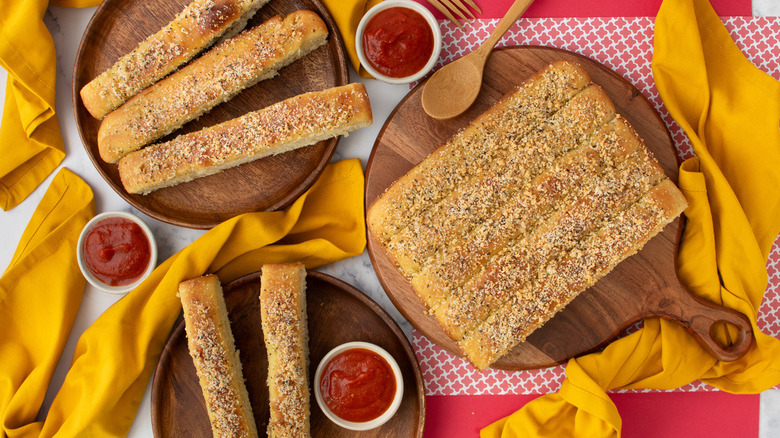 Pizza Hut breadsticks on wooden boards