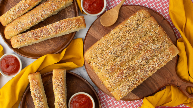 Pizza Hut breadsticks on wooden boards