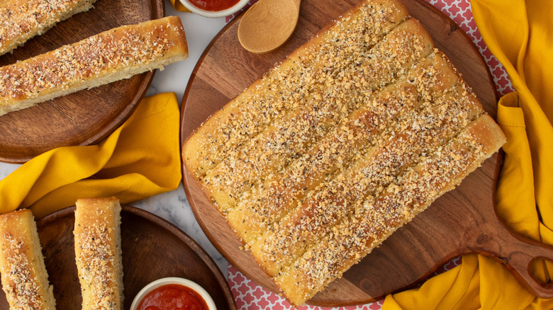 Pizza Hut breadsticks on wooden boards