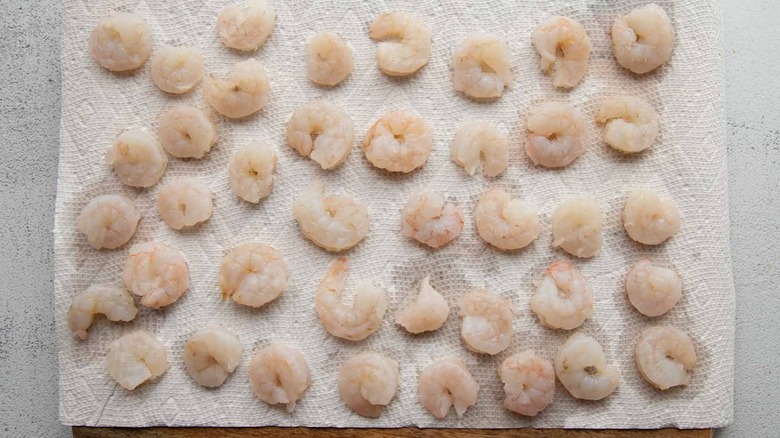 raw shrimp on a paper towel