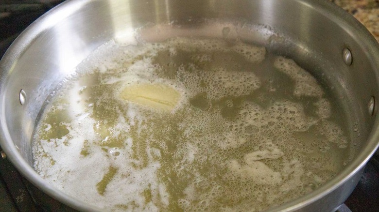 butter melting in skillet