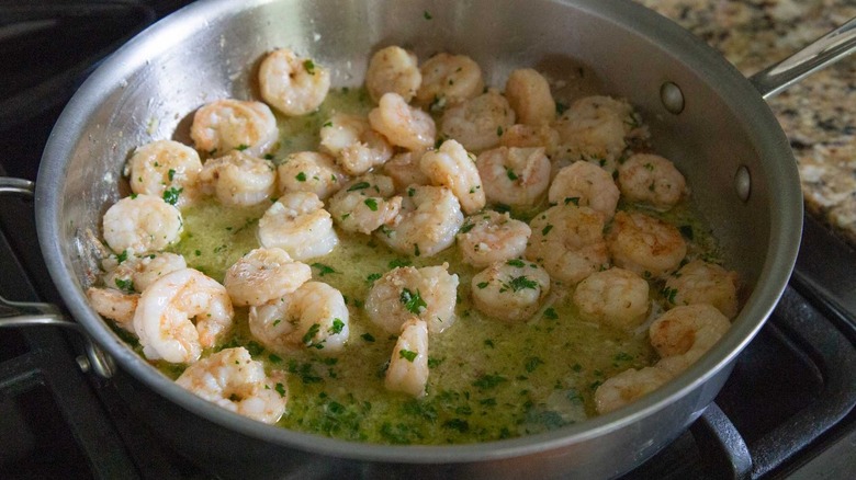 shrimp scampi in a metal pan