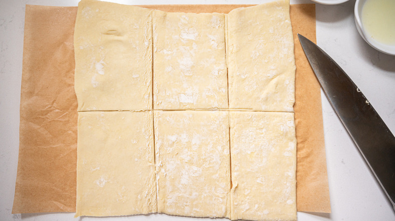 pastry sliced in six pieces with knife