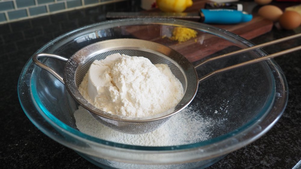 sifting flour for baking copycat Starbucks lemon loaf