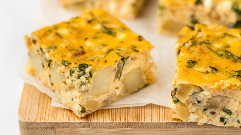 Close up of square of potato chive bake