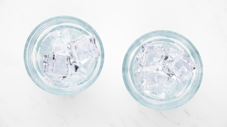 Two glasses filled with ice