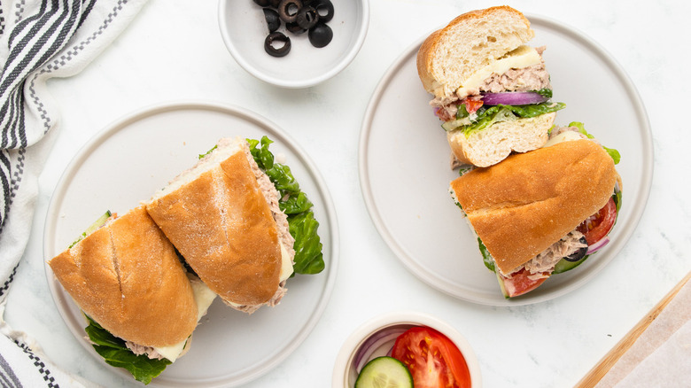 tuna sandwich halves on plates