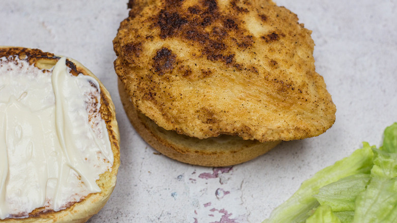 Assembling a Copycat Wendy's Chicken Sandwich with mayo