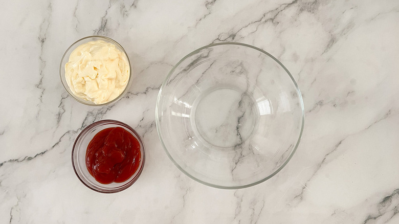 mayonnaise ketchup and glass bowl