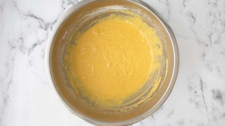 yellow cake mix in metal bowl