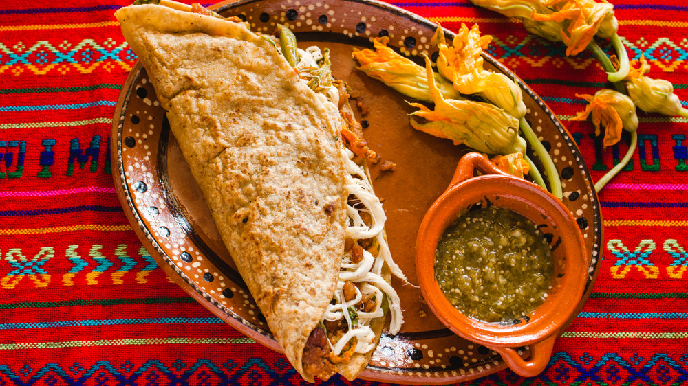 Corn tortilla quesadilla with squash blossoms