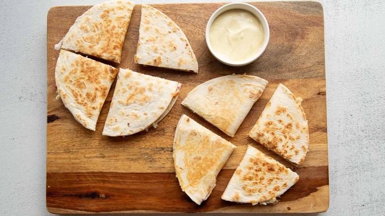 sliced quesadillas with dipping sauce