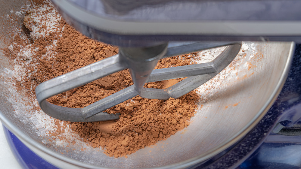 mixing dry ingredients for Costco copycat chocolate muffins