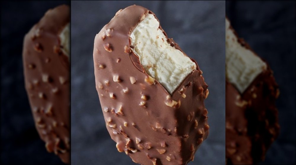 a Haagen-Daz vanilla milk chocolate almond ice cream bar