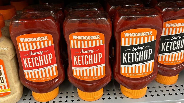 Whataburger ketchup bottles on shelf