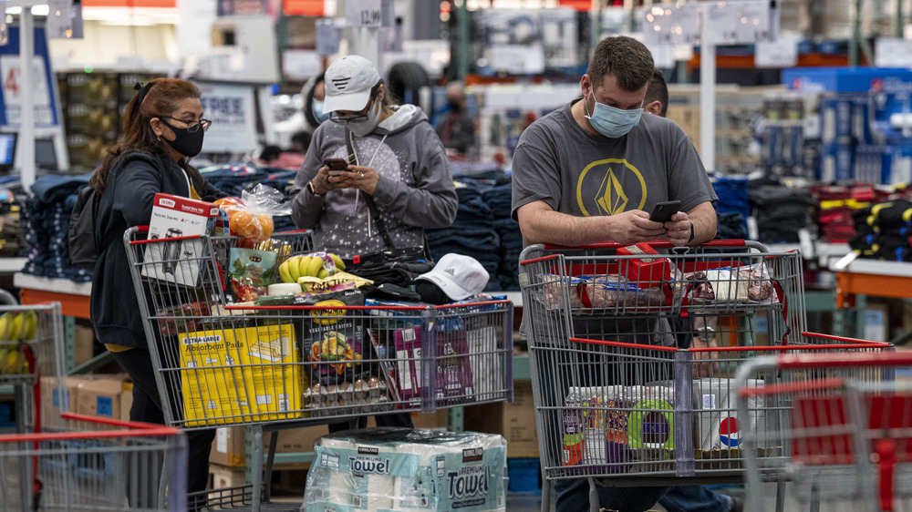 People shopping inside Costco warehouse