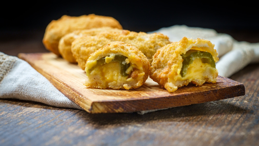 Jalapeno poppers on wood plank