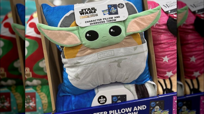 Yoda throw pillow in box