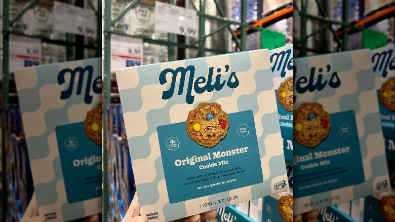 Person holding a box of Meli's Original Monster Cookie Mix