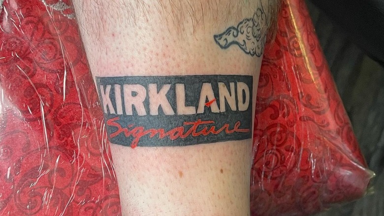 Tattoo of Kirkland Signature on leg