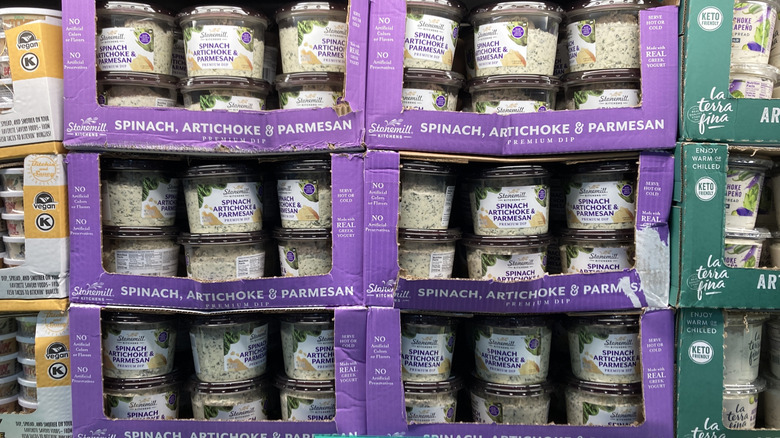 tubs of spinach artichoke dip